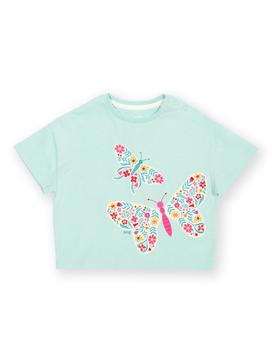 Light blue t-shirt with butterfly designs on a white background