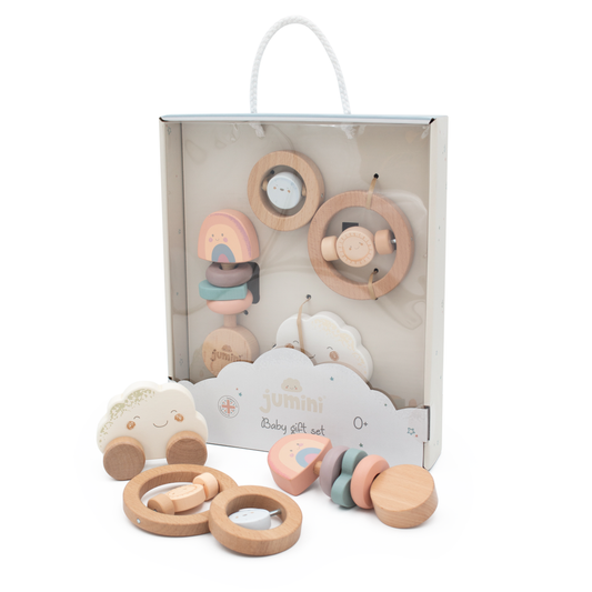 Wooden baby teething ring set with packaging on a white background