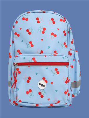 A light blue backpack with a red and green cherry pattern, featuring a front zippered pocket with a red zipper and a white circular 'Pine Blue' logo patch.